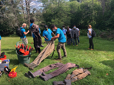 Great Lakes Community Conservation Corps and Cream City Conservation Corps working together at Cedar Creek