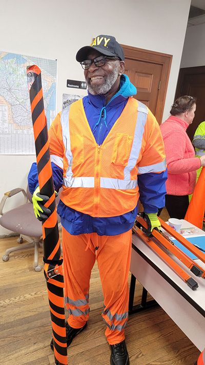 Veterans Corps member readying for community traffic control preparation