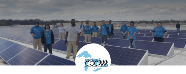 picture of Great Lakes CCC students on rooftop with solar panels