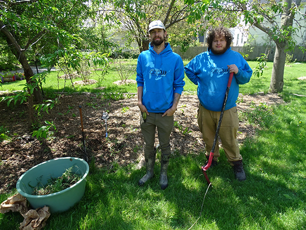 Michael Brichta (left) and Great Lakes Community Conservation Corps member Daniel Metz at Unity Orchard Park.